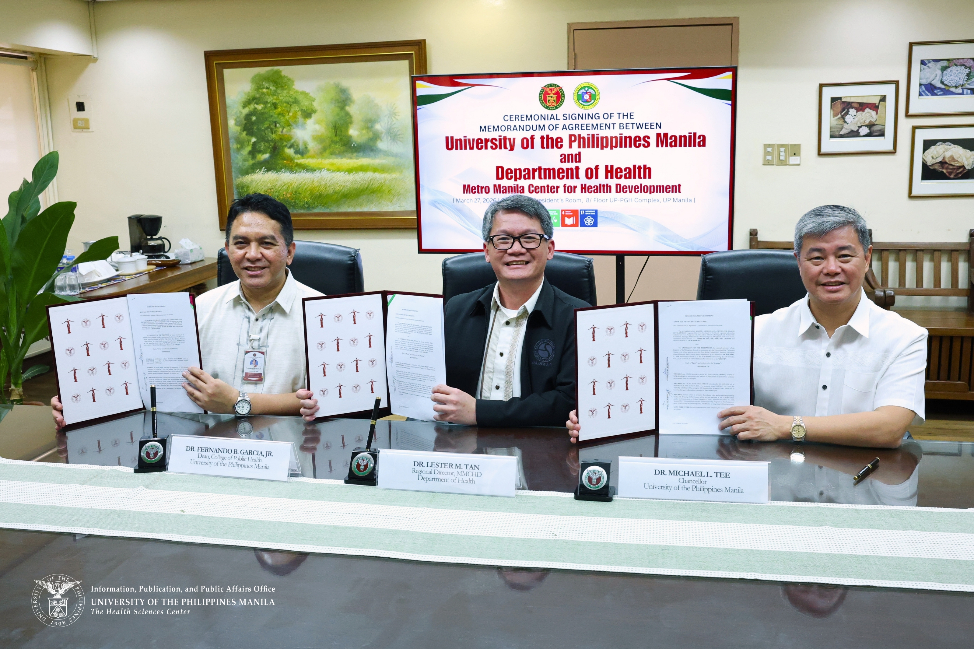 (from left): College of Public Health Dean Fernando Garcia holds the copy of the signed Memorandum of Agreement alongside Department of Health Metro Manila Center for Health Development Director IV Lester Tan, and Chancellor Michael Tee.
