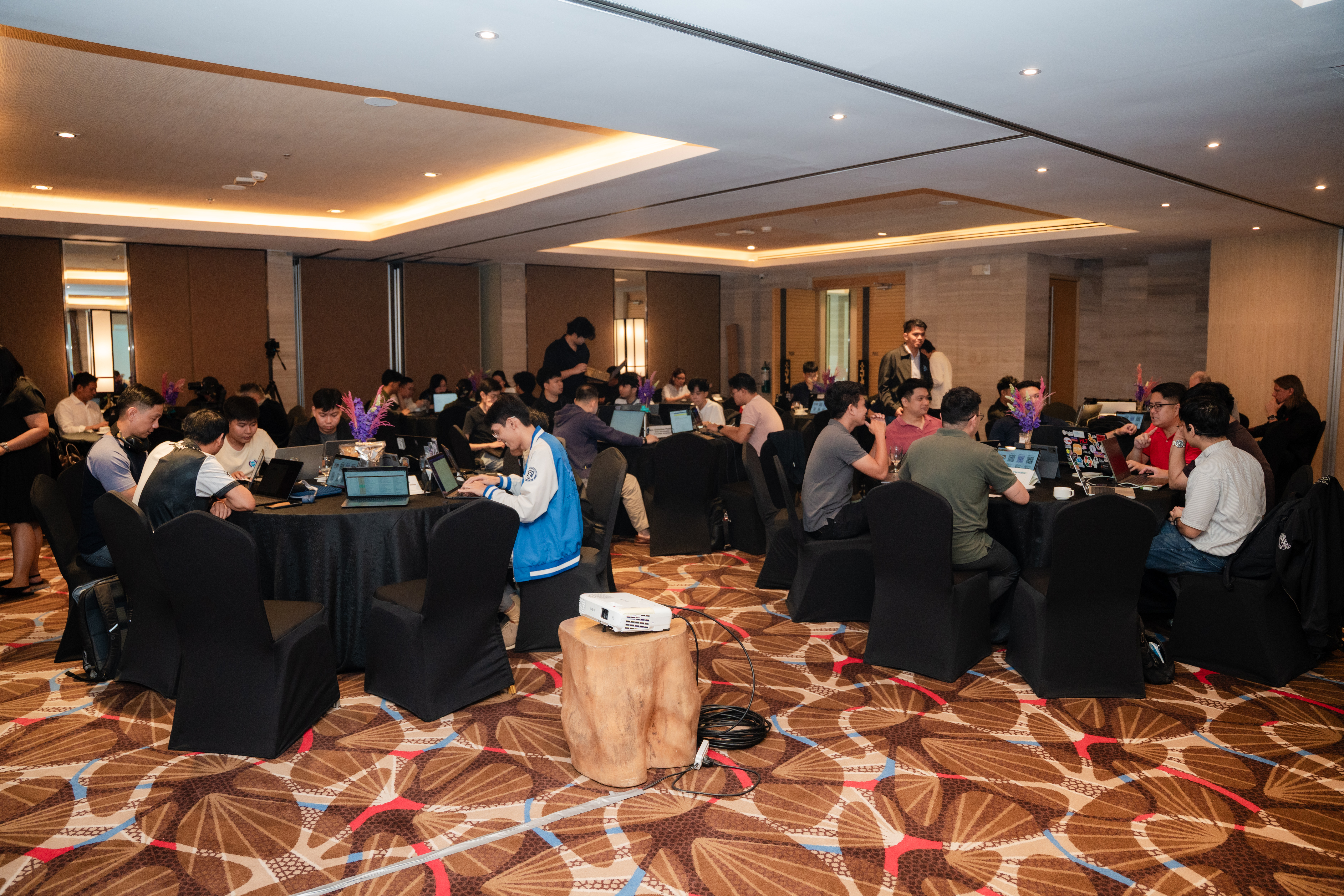 Thirteen teams of EMR developers work intently during a software development block at the June 2026 Philippine FHIR® Connectathon